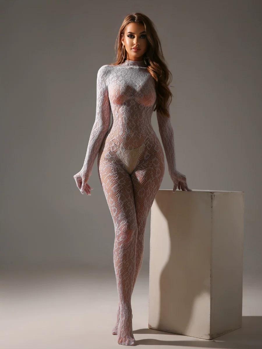 Back view of white sheer lace body stocking showing fully open spine and continuous diamond lace pattern