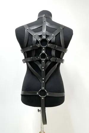 Black faux leather web pattern body harness on model