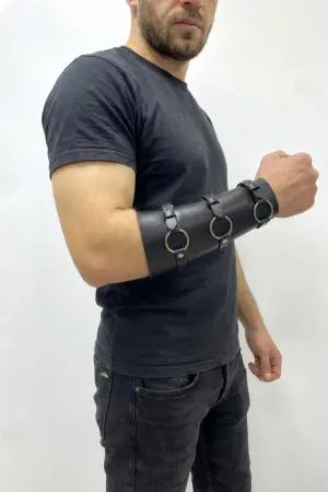 Black faux leather triple O-ring arm cuff with adjustable buckles