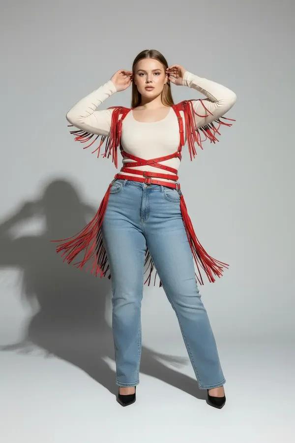 red faux leather body harness with long fringe shoulders and four-strap caged waist silver buckles plus-size model street