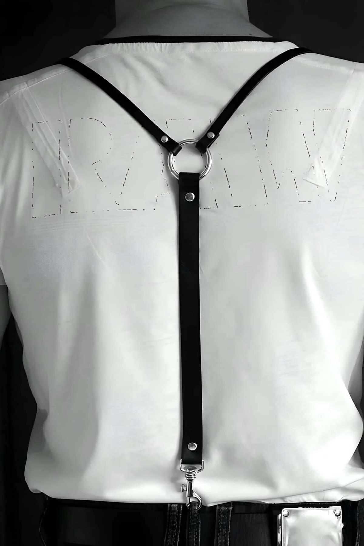 Black faux leather chest harness with O-ring back detail for festival outfit