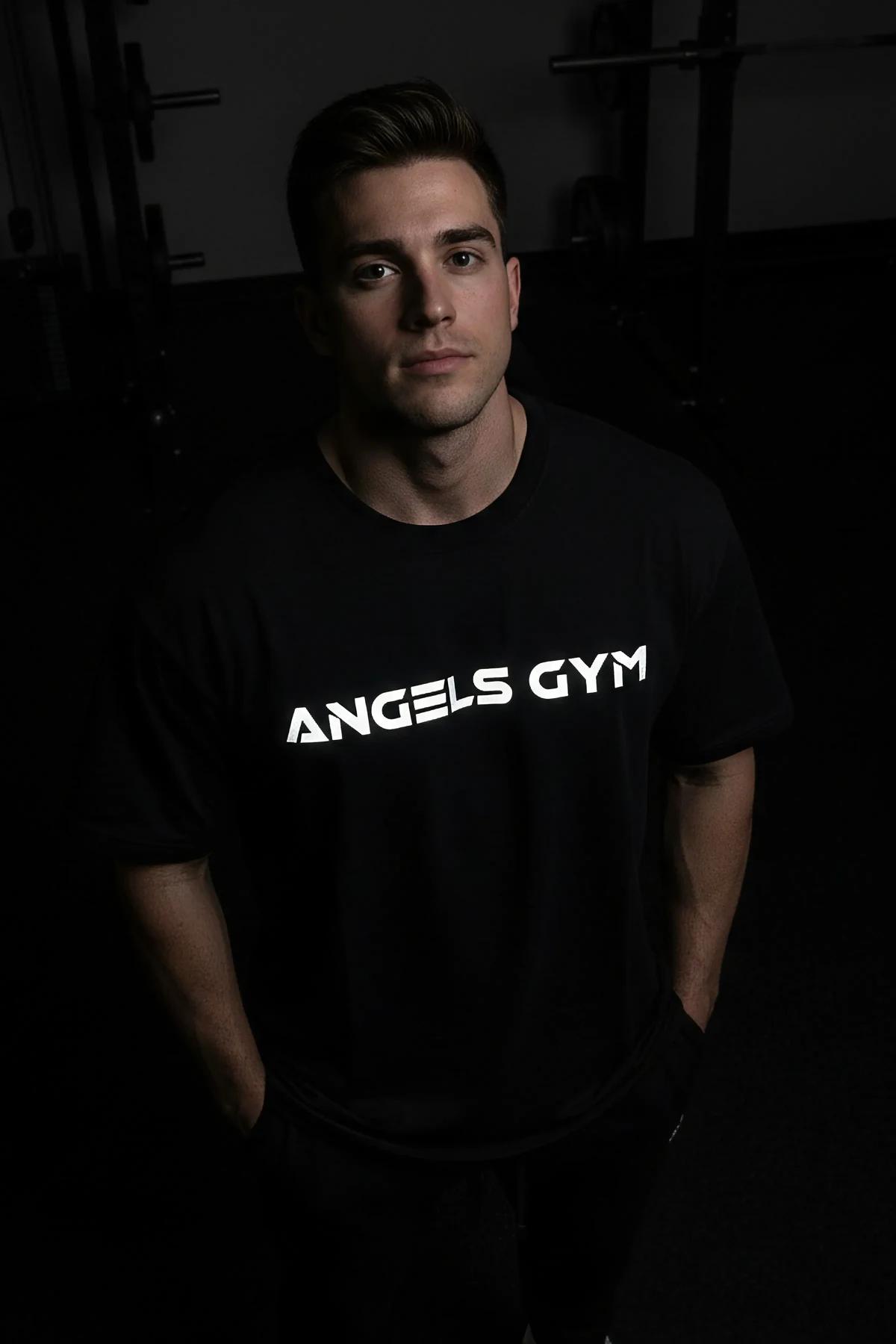 black oversized graphic t-shirt bold white ANGELS GYM logo print crew neck relaxed fit