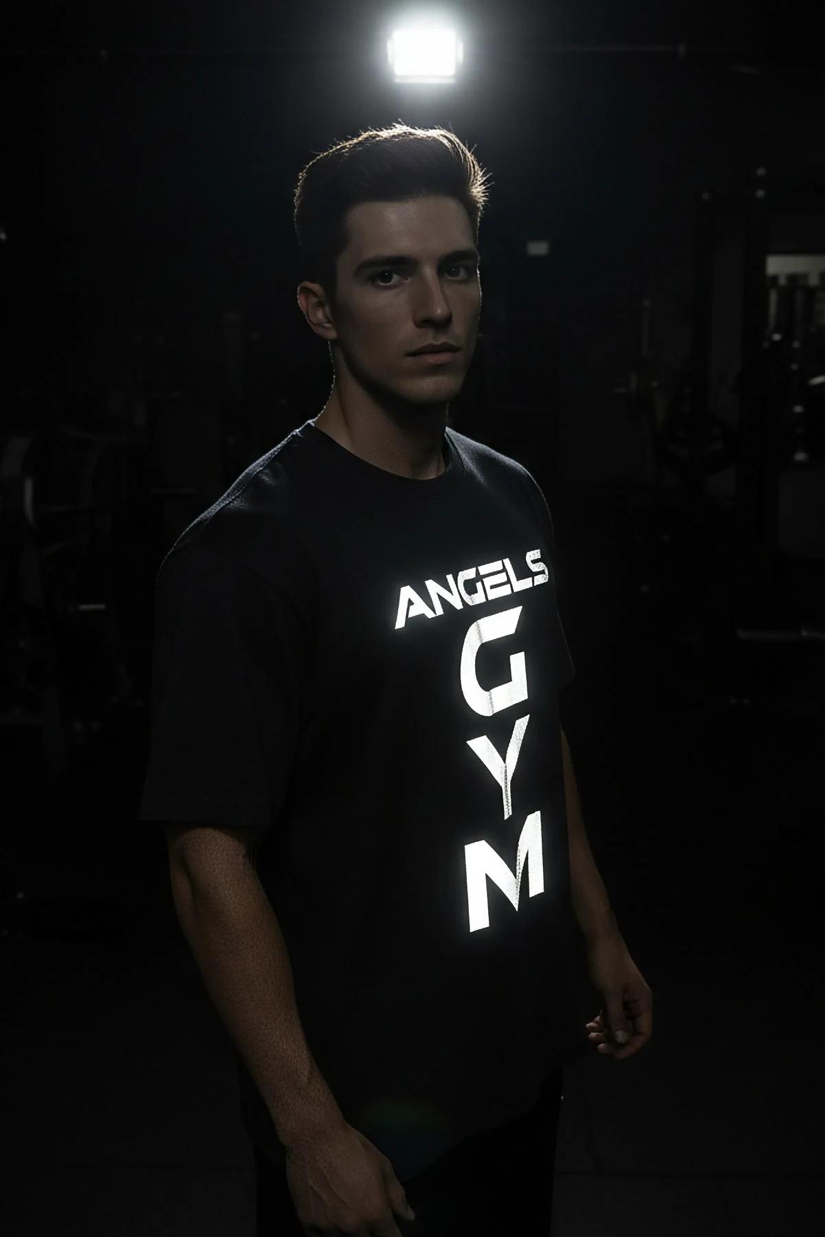 oversized drop-shoulder black t-shirt with white graphic lettering on chest close-up