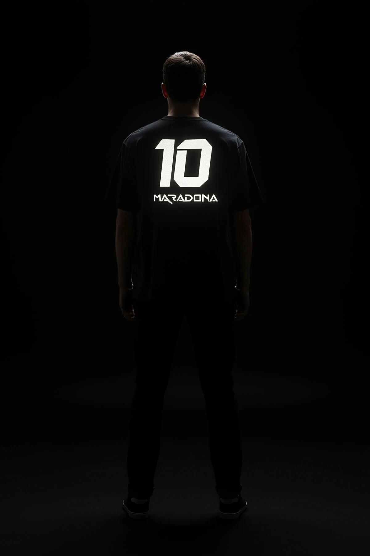close-up of retroreflective white number graphic on black jersey knit fabric