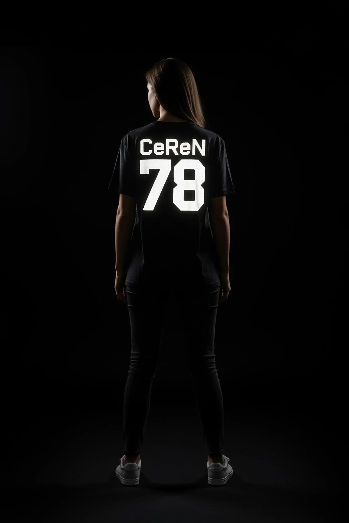 custom text reflective t-shirt grey relaxed fit full length front view dark setting