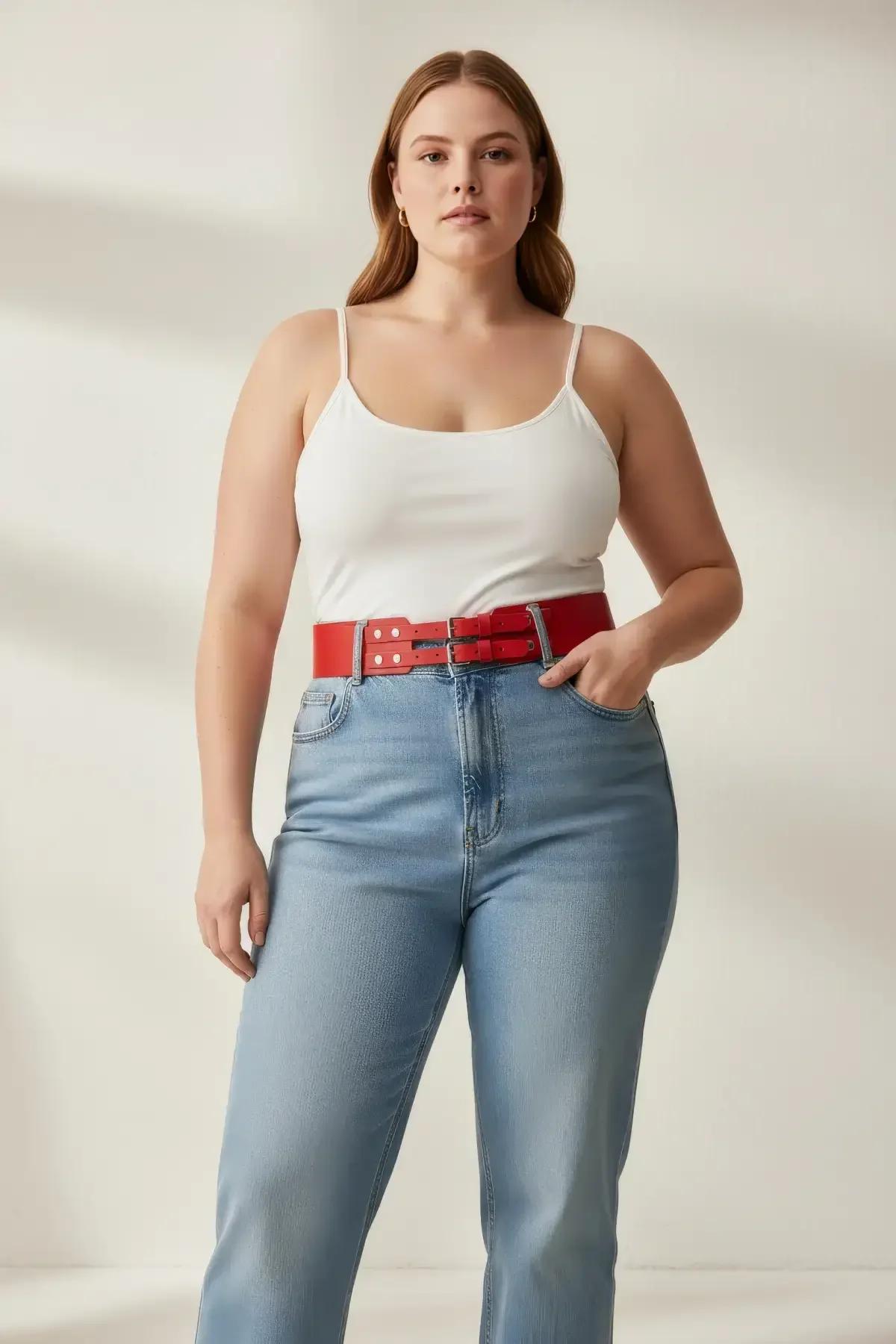 close-up of dual silver-tone pin buckles on smooth red faux leather wide belt
