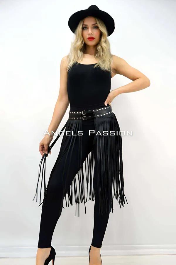 Black faux leather fringe skirt overlay with double silver-tone studded buckle belt worn over black leggings