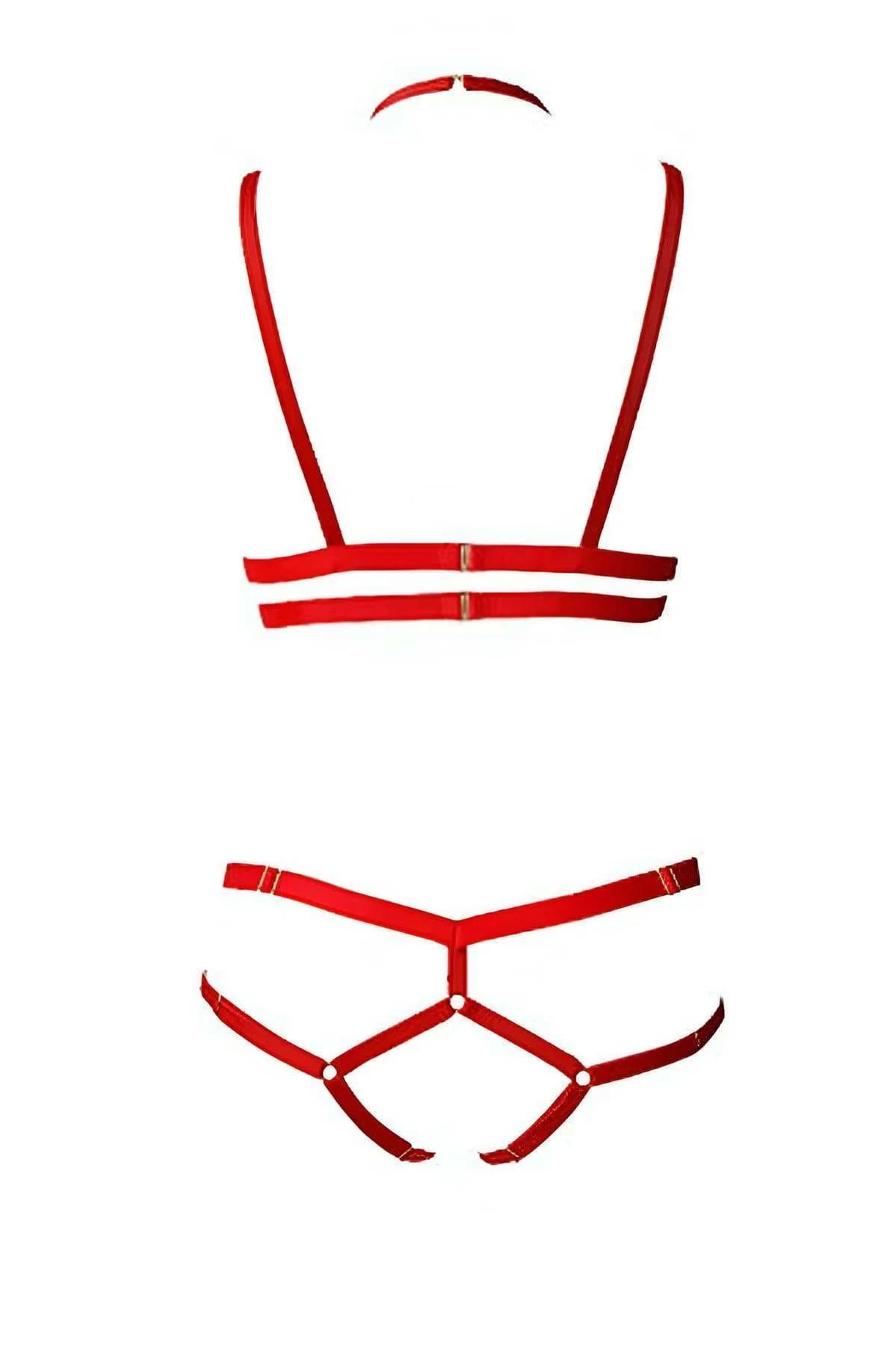 Red strappy body harness over torso showing shoulder-to-underbust strap configuration