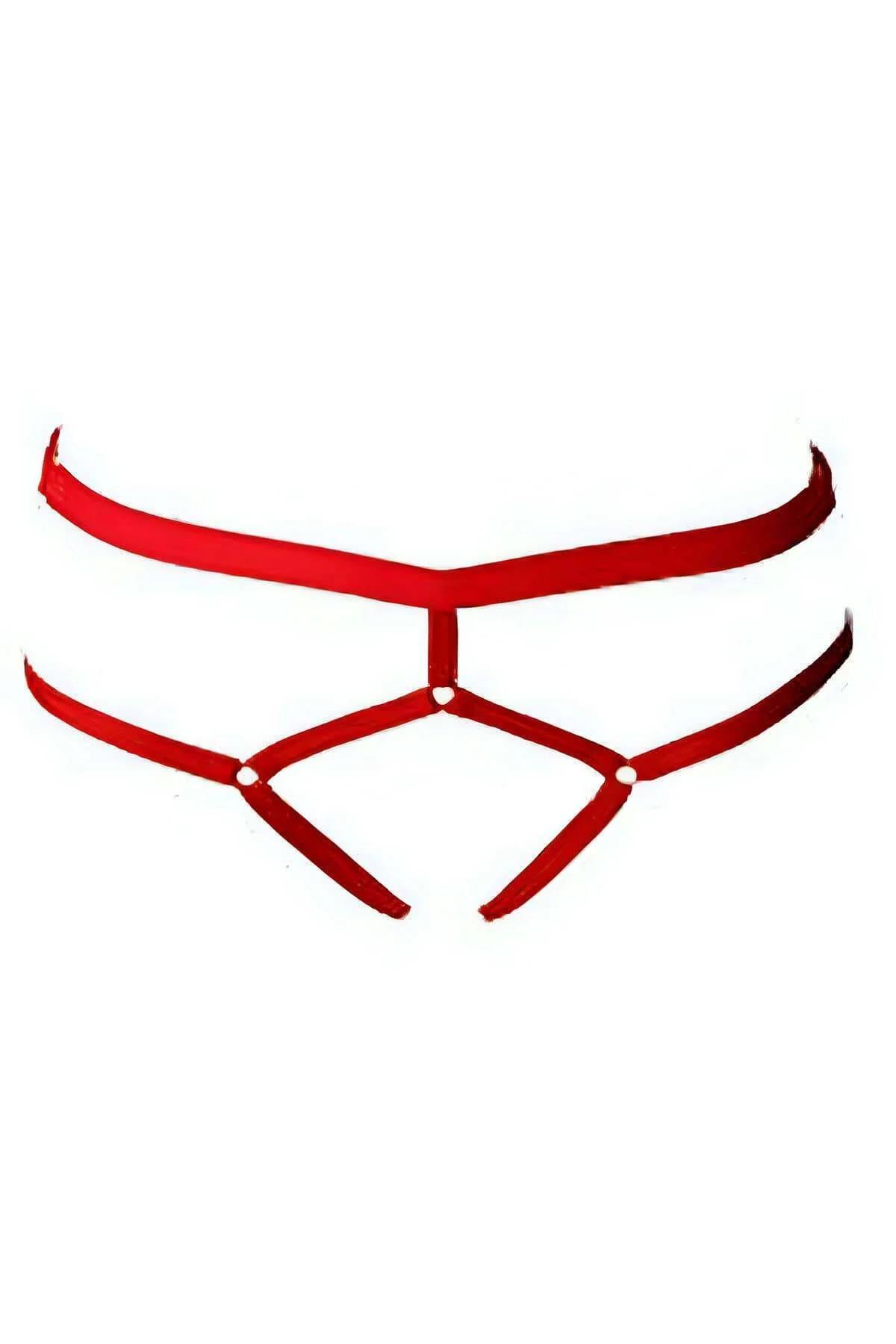 Red multi-band thong harness laid flat showing geometric strap configuration and central connector