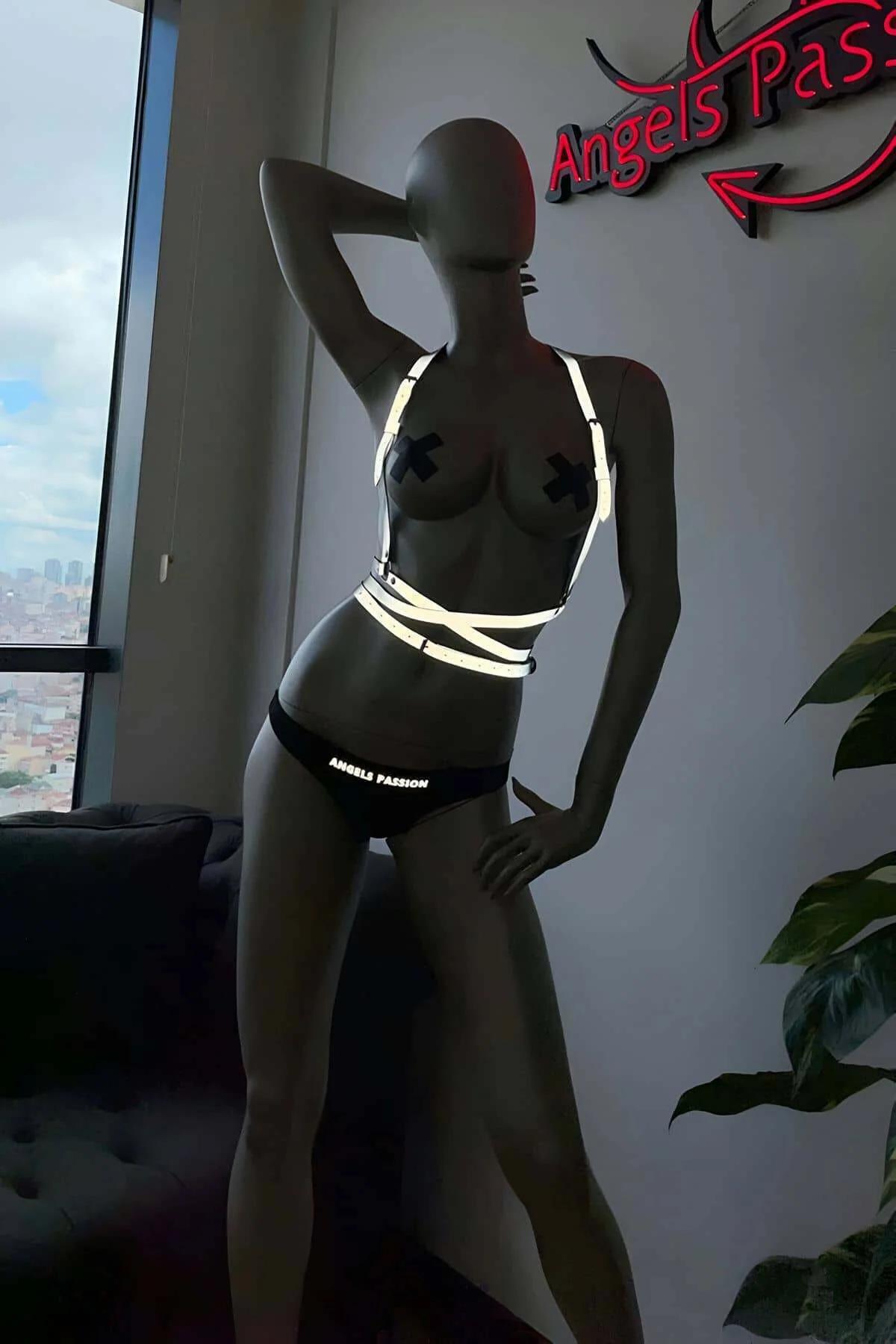Reflective festival harness black straps adjustable buckle close-up