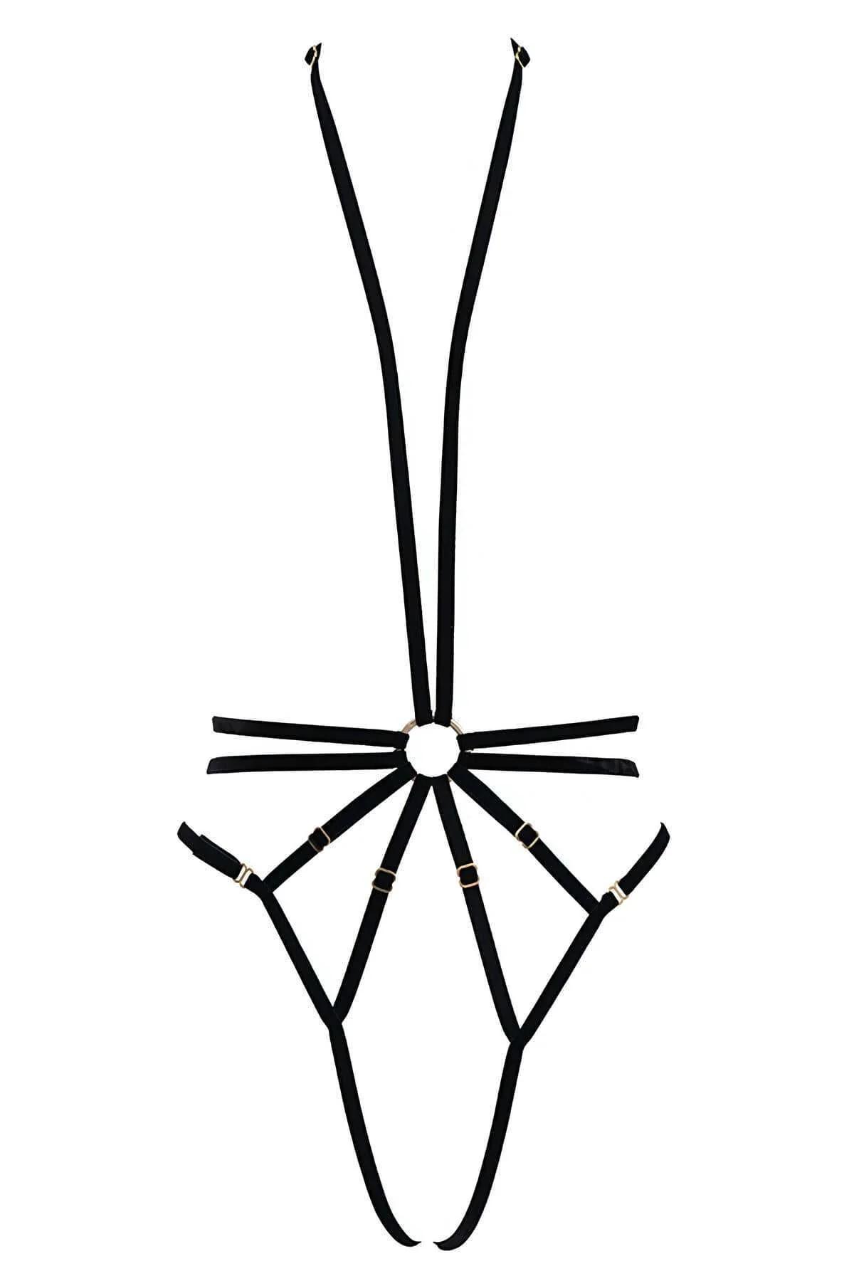 black matte elastic body harness worn under open blazer, torso layering detail