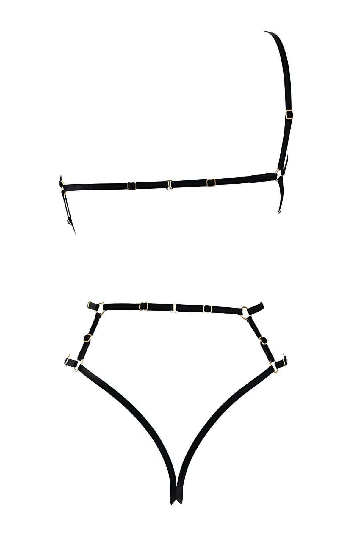 black multi-strap adjustable body harness worn over crop top fashion styling