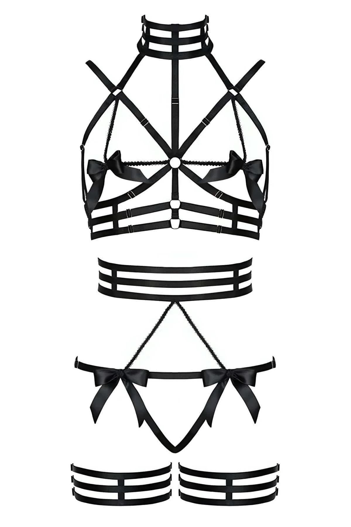 Black elastic cage bra harness showing gold-tone O-ring hardware and three cross-connected chest bands