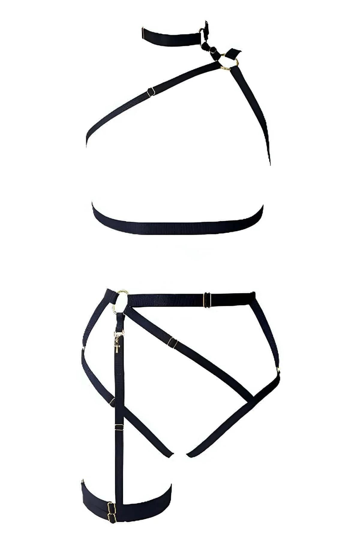 black harness waist belt with gold hardware worn over bare skin detail