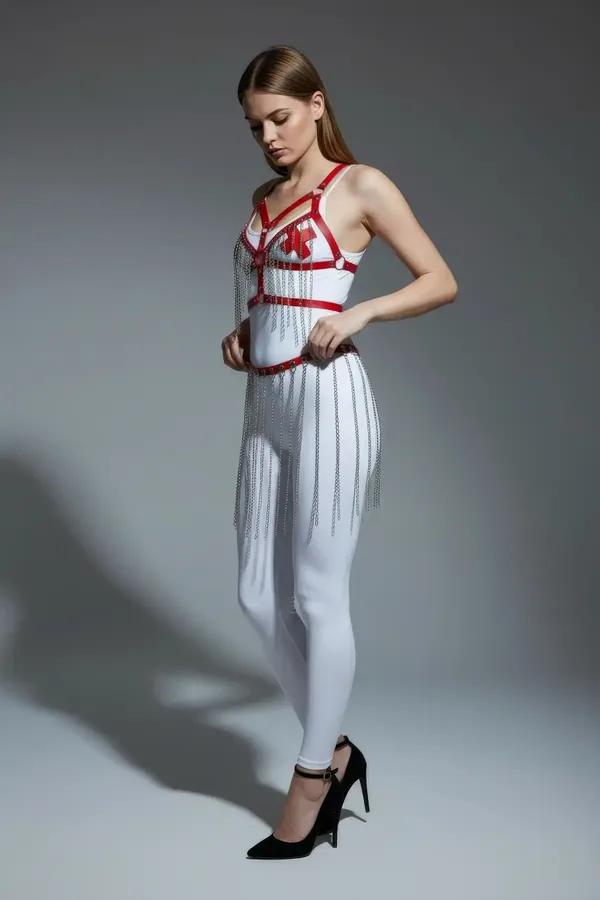red faux leather chest harness with silver chain fringe skirt belt set, O-ring hardware, full-length view