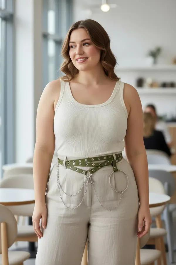 olive green faux leather belt harness with dual grommet rows silver draped chains and center O-ring worn at waist