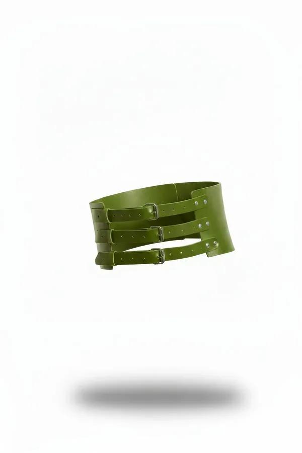 olive green wide faux leather waspie corset belt with three stacked silver pin buckles, curved panel silhouette
