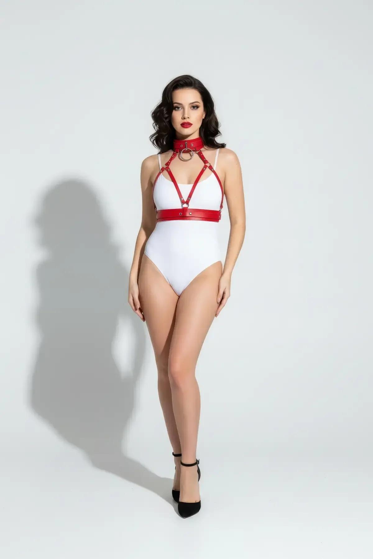 Adjustable red chest harness band sitting at underbust level on model from front angle
