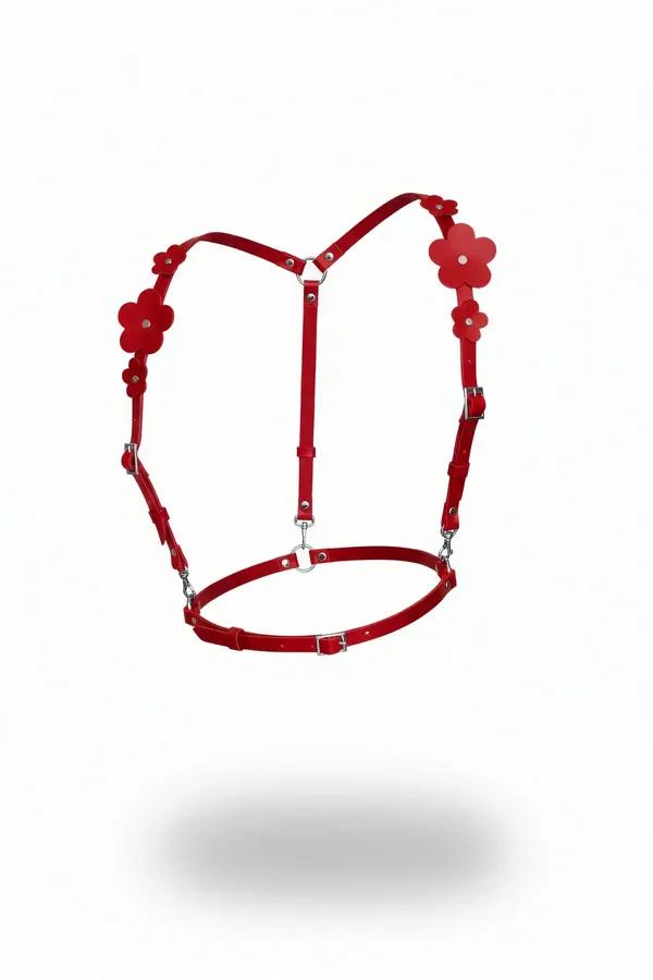 red faux leather body harness with five flower appliques and silver D-rings front view
