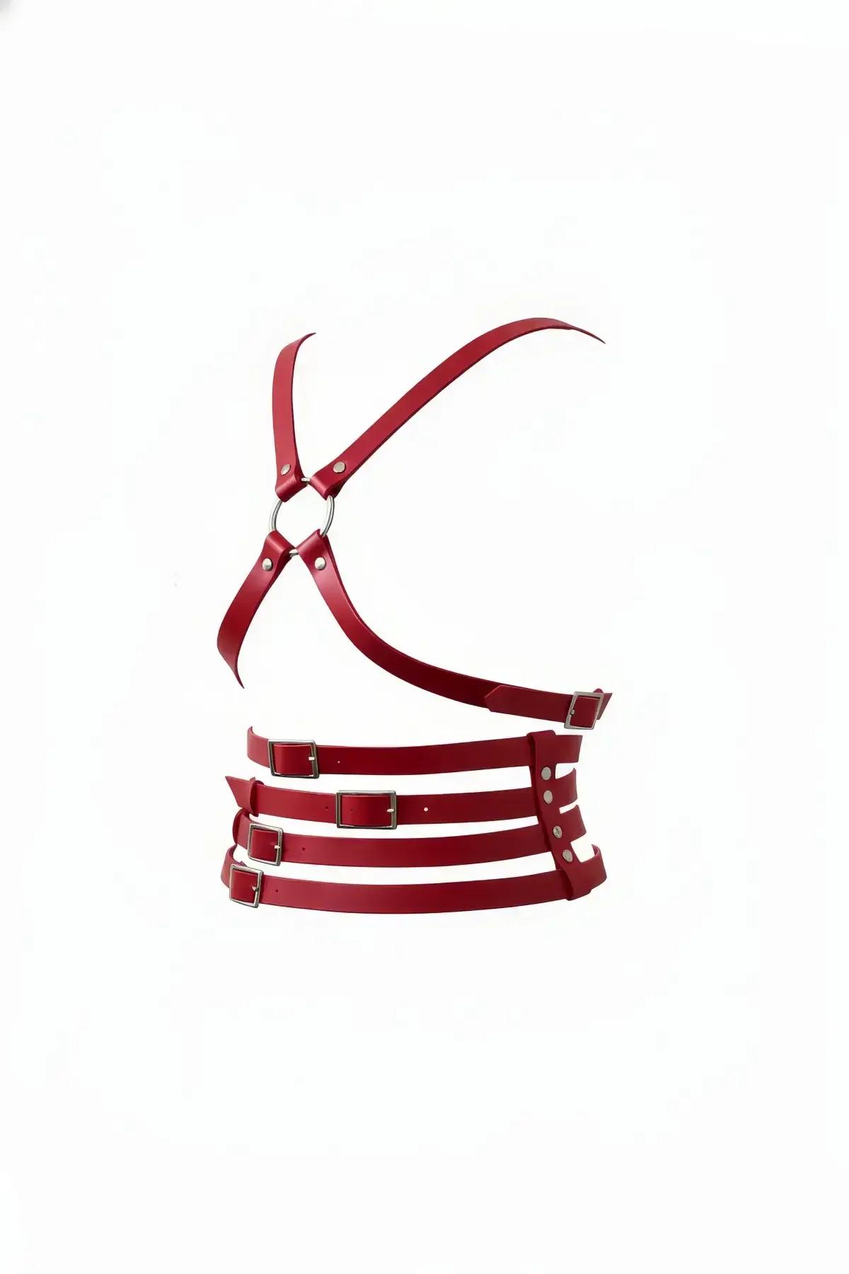 Red faux leather O-ring chest harness with three stacked silver buckle waist bands on white background