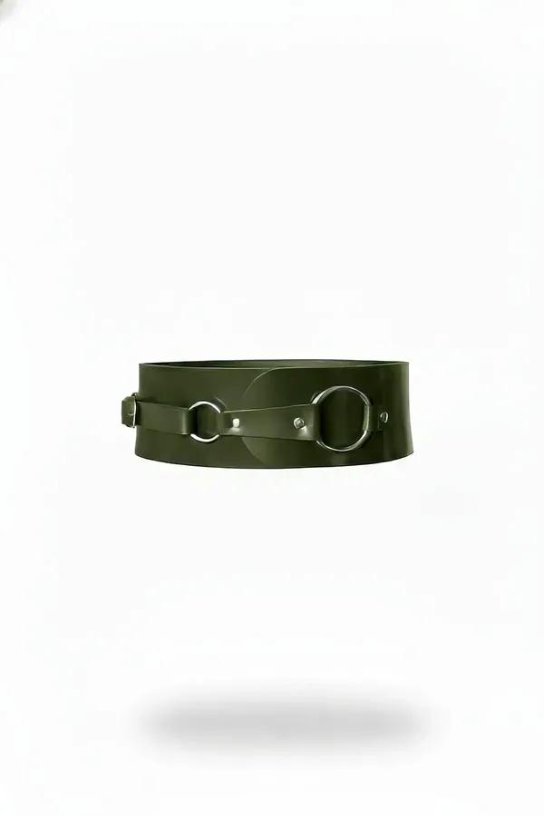 olive green vegan leather wide waspie belt with two silver O-rings riveted on front strap, smooth matte finish