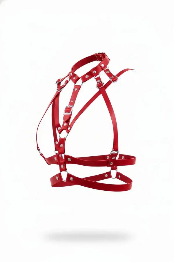 Red multi-strap chest harness faux leather with silver D-rings and adjustable buckles on white background