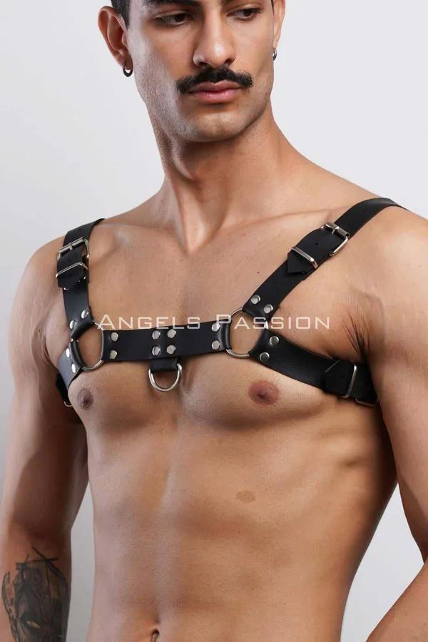 black faux leather men's chest harness with dual silver O-rings and adjustable shoulder buckle straps