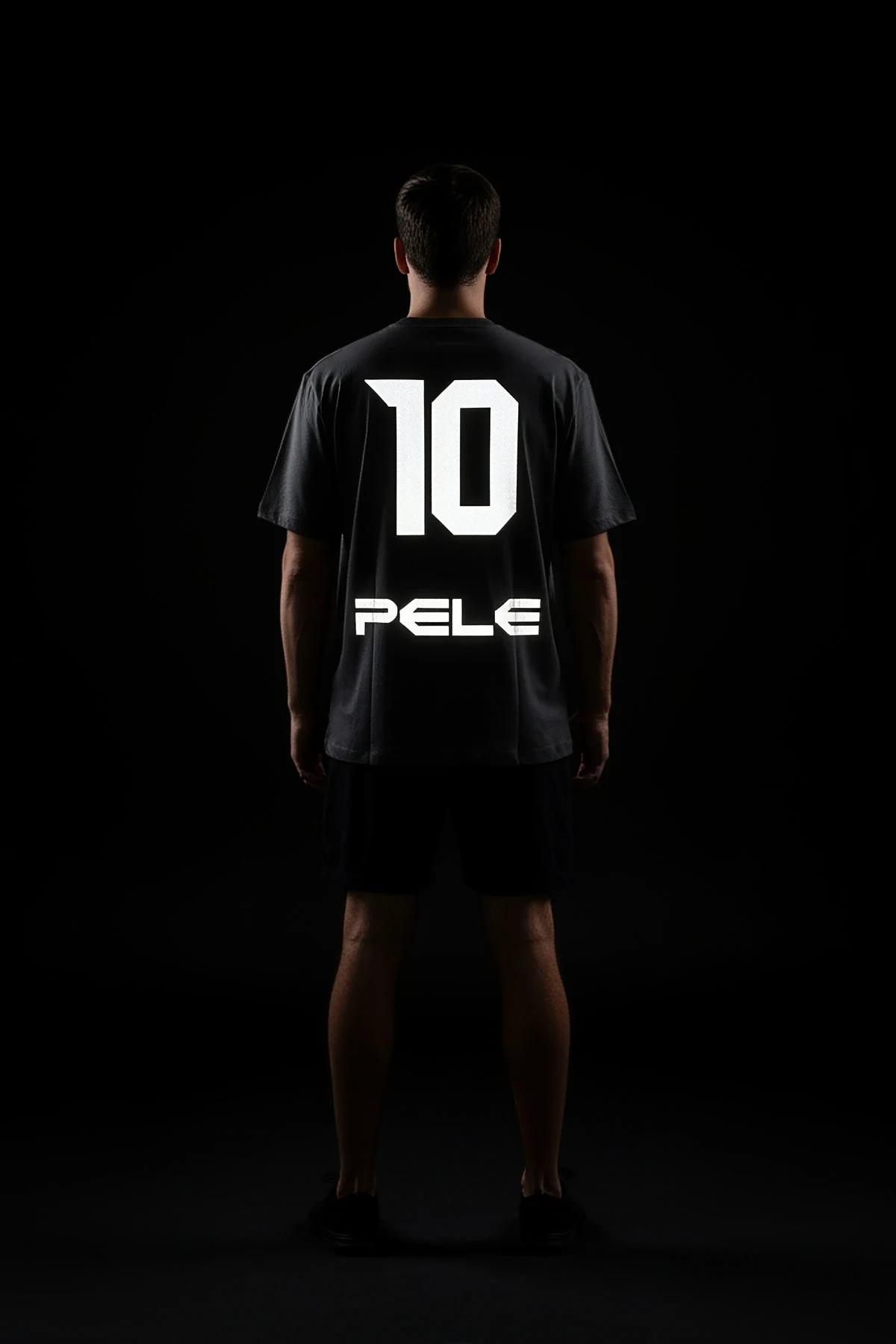 black oversized sport jersey back view with large white reflective number 10 and custom name print