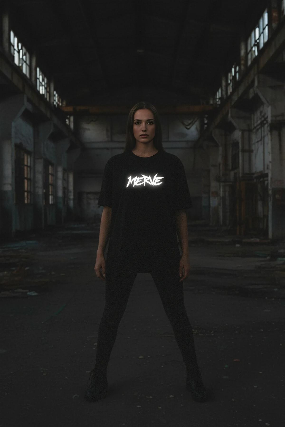black oversized reflective logo t-shirt with graffiti MERVE chest print, drop-shoulder fit, mid-thigh length
