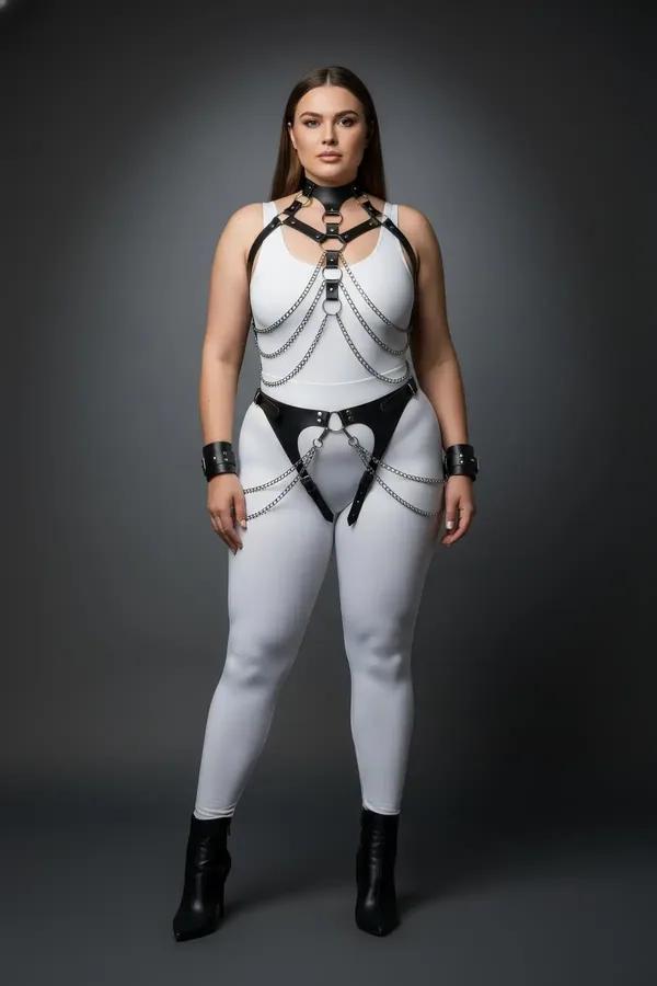 Black faux leather full body harness with cascading silver chains, choker collar, thigh straps and wrist cuffs on plus-size m