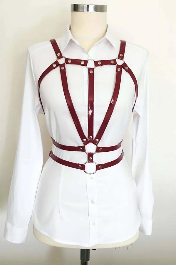 burgundy glossy faux leather chest harness with silver rivets and dual O-rings front view