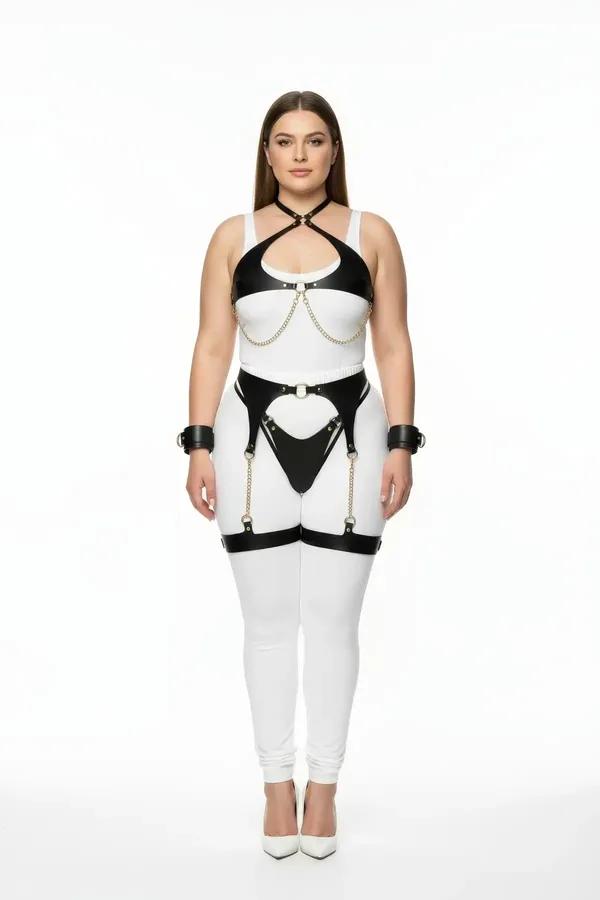 plus size black faux leather chain harness set with garters and wrist cuffs, gold-tone hardware, modeled on curvy figure