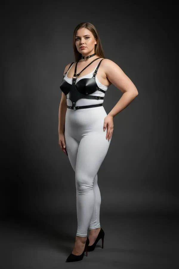 black faux leather chest harness with structured cups and matching O-ring choker set with gold-tone hardware