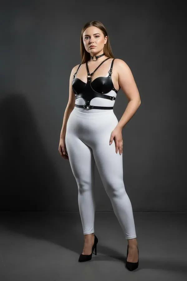 black faux leather chest harness with structured cups and matching O-ring choker set with gold-tone hardware