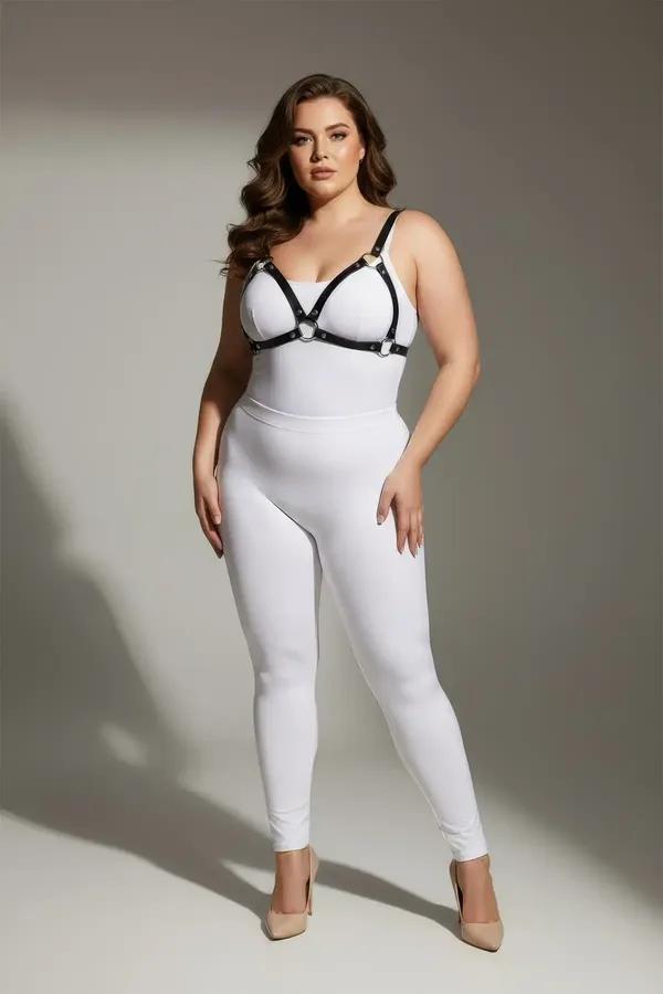 black faux leather o-ring chest harness with slim 1 cm straps and silver center ring worn over white outfit