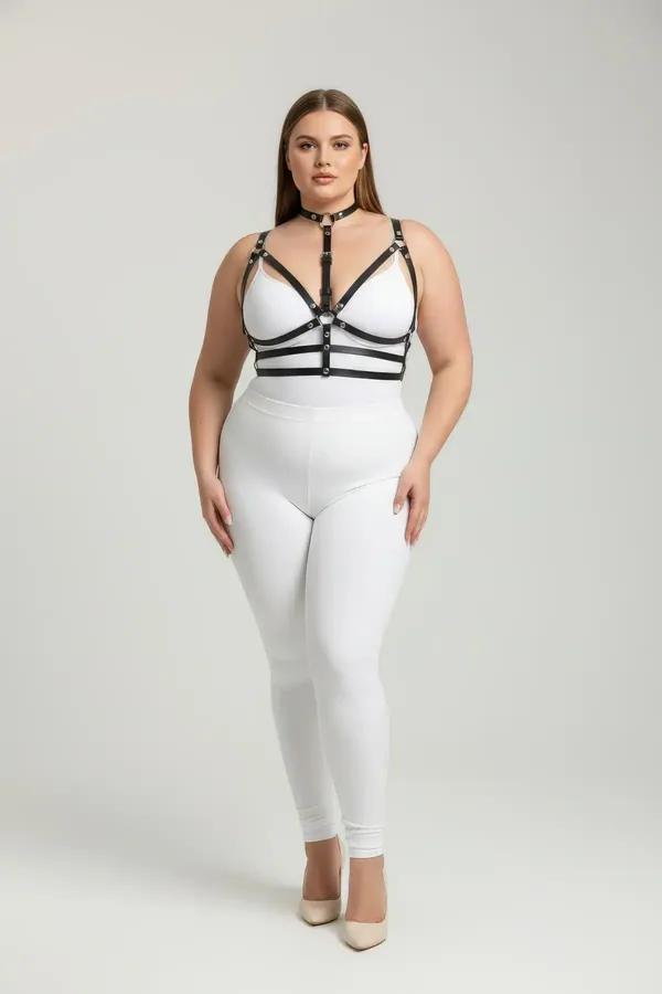 black faux leather strappy choker harness bra with silver O-ring center and multi-strap underbust bands worn on plus-size mod