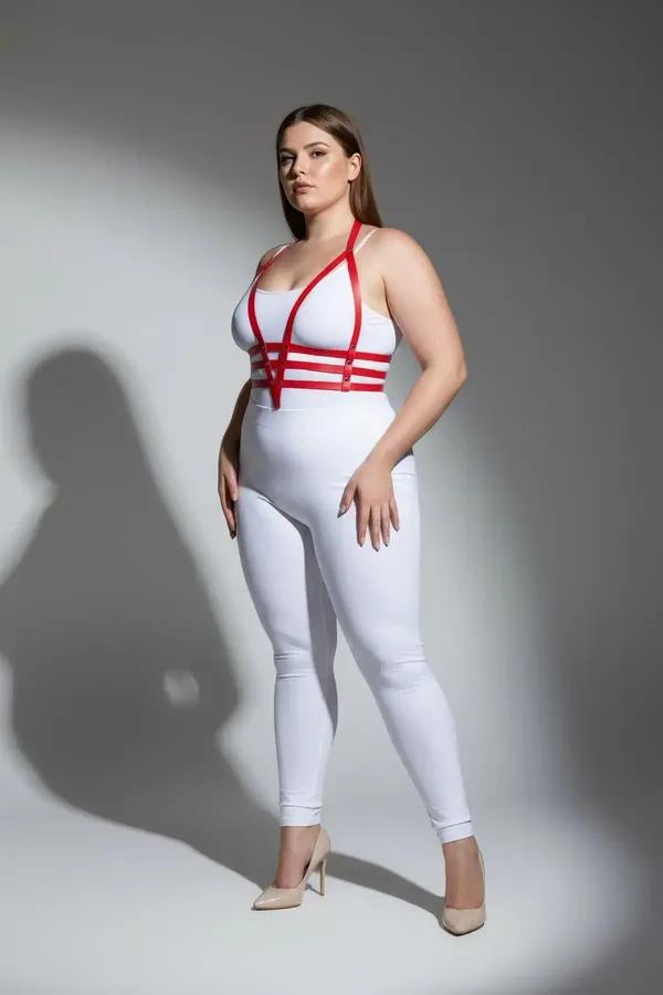 red faux leather strappy body harness with four horizontal chest bands and silver hardware worn by plus-size model