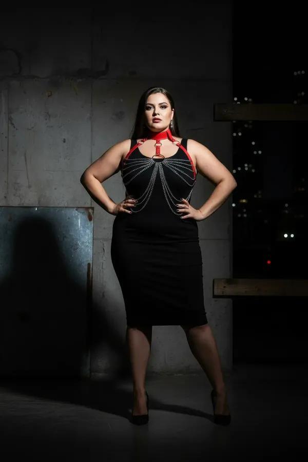 Red faux leather chain body harness with wide choker collar and cascading silver chain drape over chest
