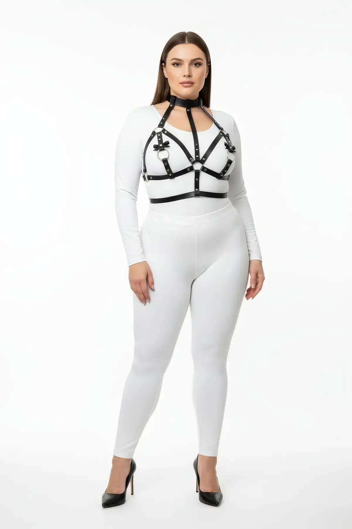 black faux leather strappy chest harness with choker neck collar and silver O-ring center worn over white top