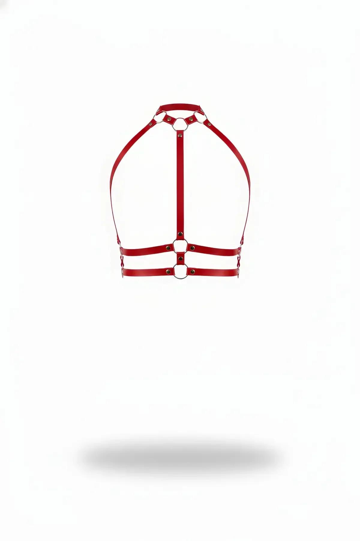 red faux leather halter harness with double underbust bands and chrome O-rings on white background