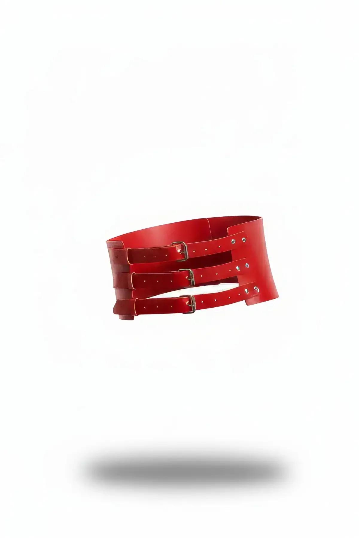 red wide faux leather waist harness with three gunmetal rectangular buckle straps and curved corset panel