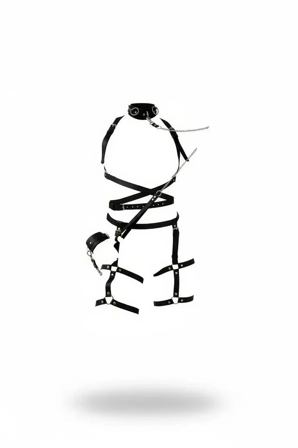 Black faux leather full body harness with collar chain, criss-cross torso straps, studded waist belt, and silver O-ring thigh