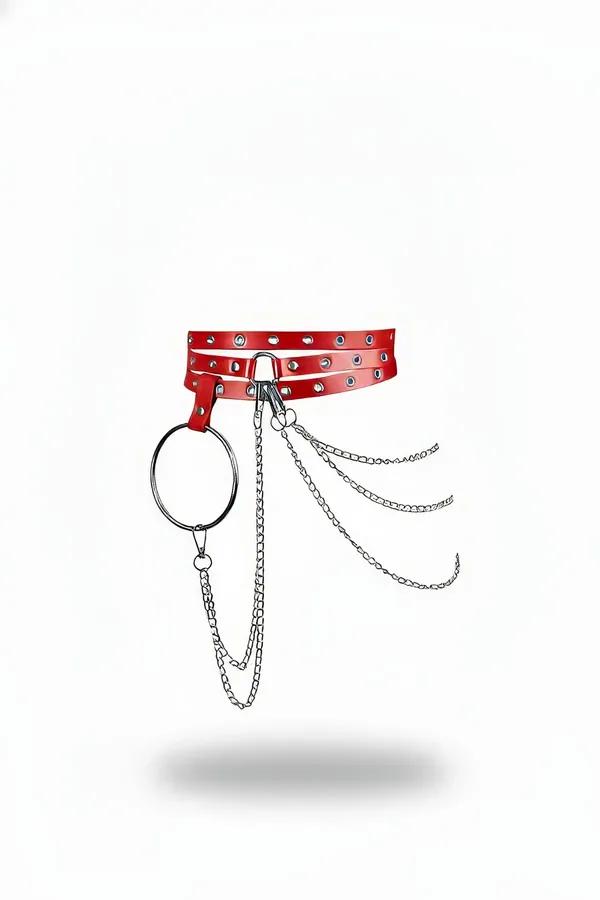 red faux leather triple strap waist harness with large silver O-ring and four draped chains against white background