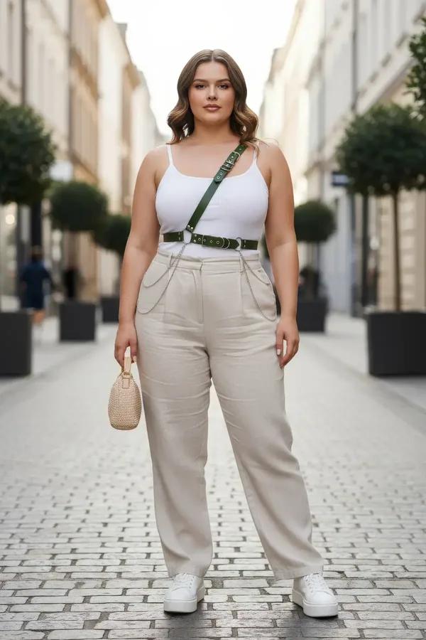 dark green faux leather body harness diagonal chest strap waist belt silver chains worn over white tank