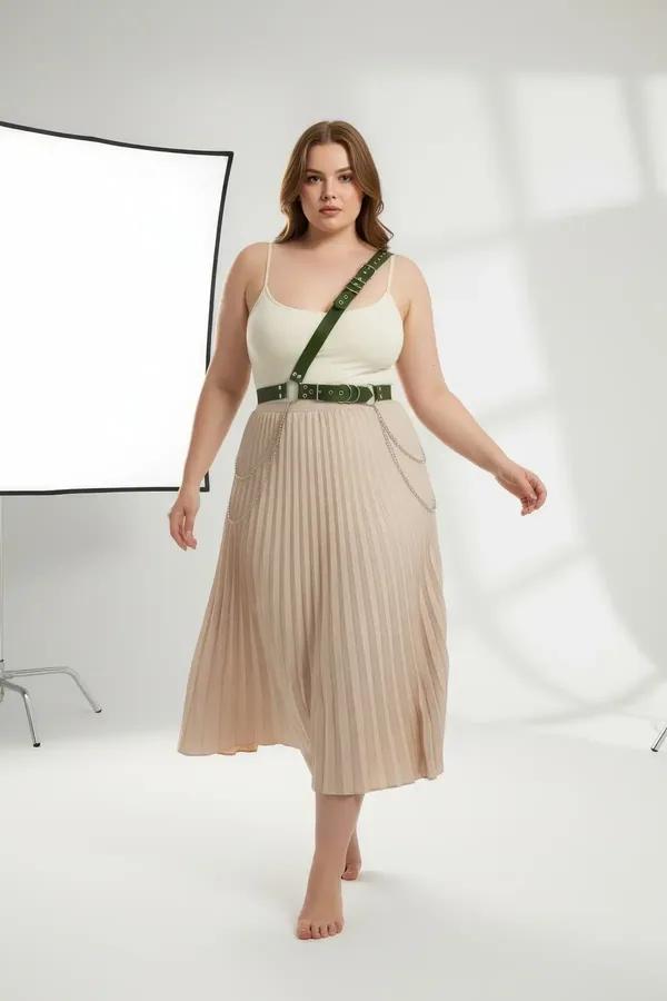 dark green faux leather body harness diagonal chest strap waist belt silver chains worn over white tank