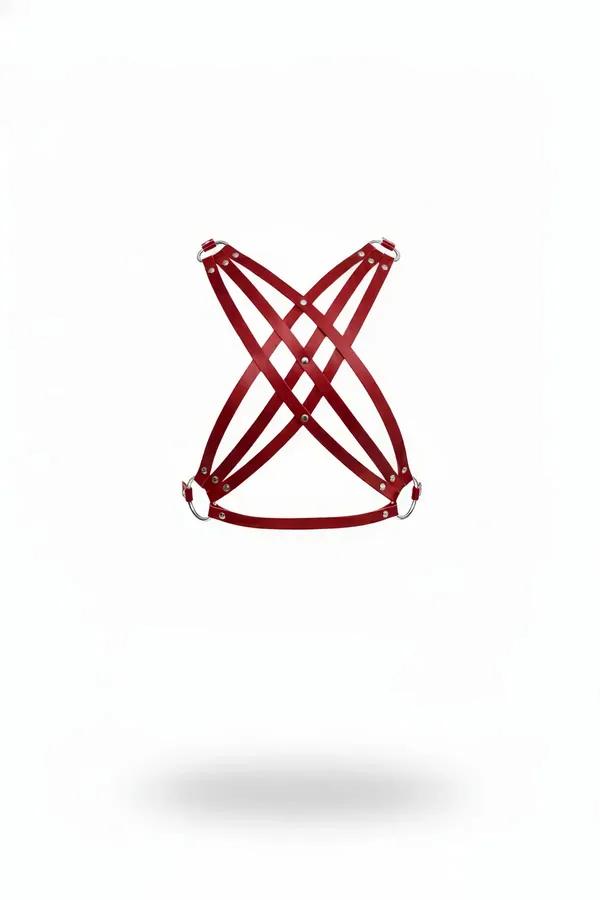Crimson faux leather chest harness with intersecting X-cross strap pattern and silver O-ring side hardware, white background