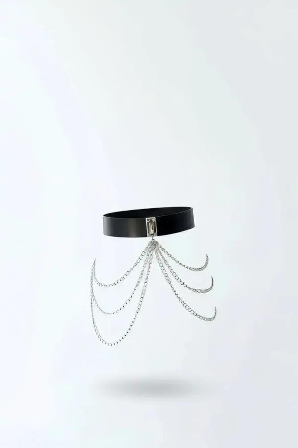 black faux leather waist harness belt with five-layer silver-tone draped chains and rectangular buckle front view