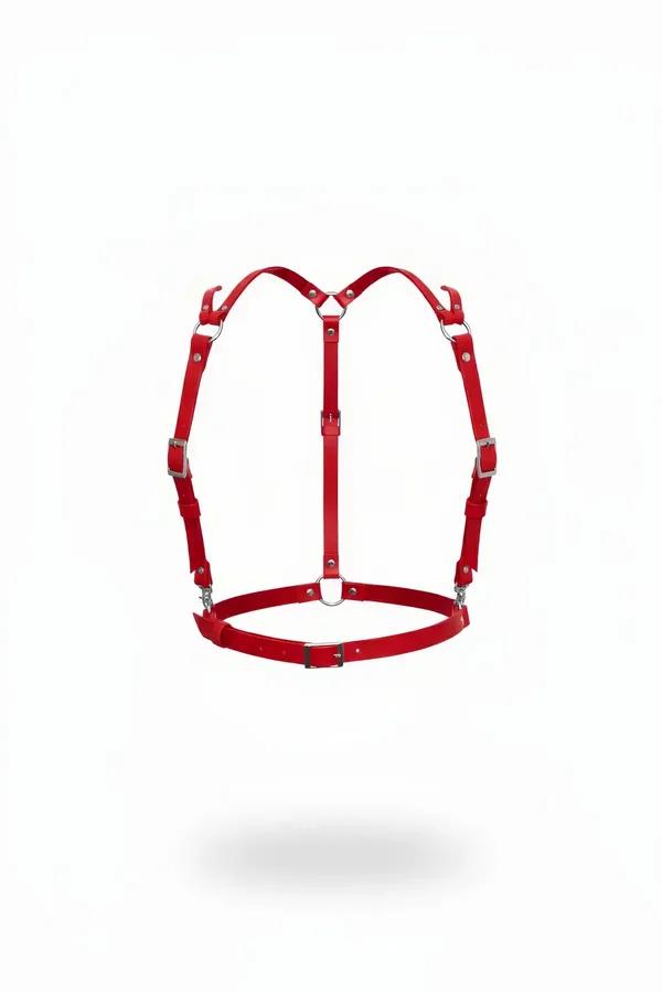 Red faux leather waist and shoulder body harness with silver O-ring buckles and adjustable straps, front view on white backgr
