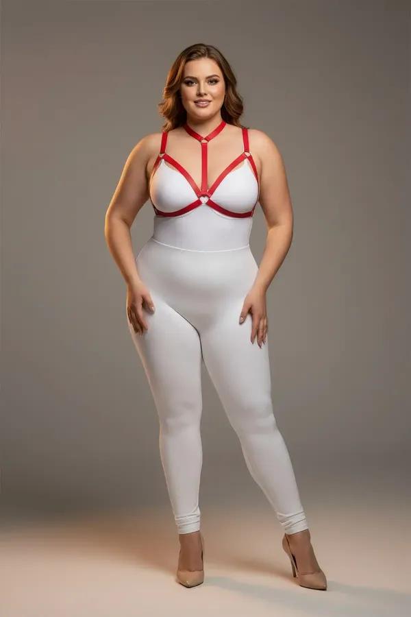 red faux leather strappy chest harness with gold O-ring accents worn over white bodysuit, plus-size model