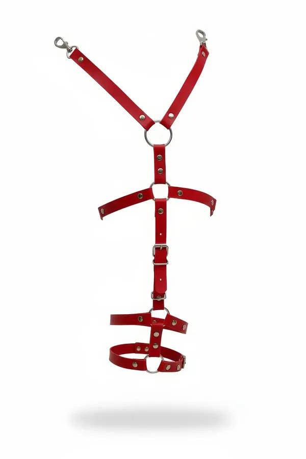 Red faux leather full body harness with silver O-rings, snap clips, and double-loop garter frame on white background